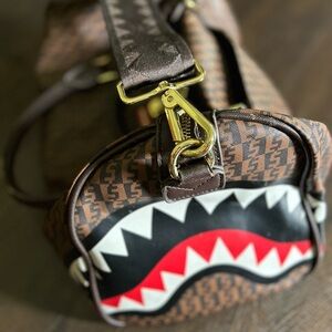 Sprayground Brown Shark Mouth Messenger Bag with Red & Black Accent